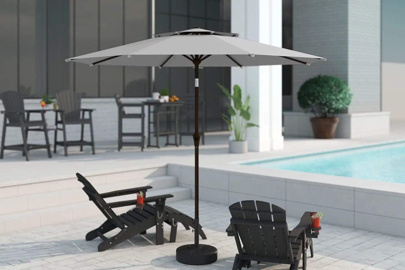 Outdoor patio scene with a large umbrella, chairs, and a pool.