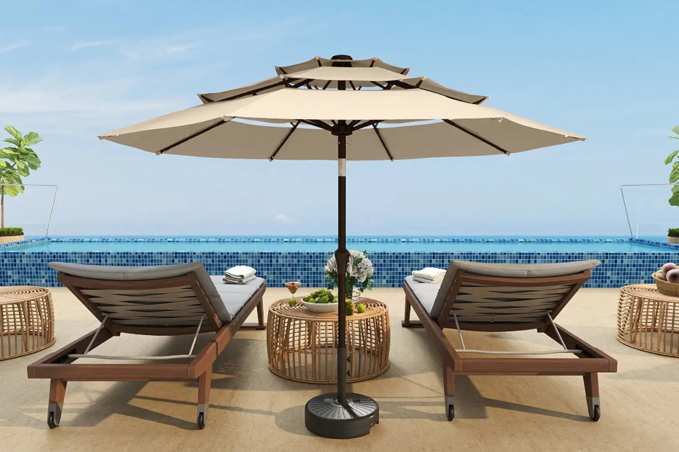 Outdoor patio set with two lounge chairs and a large umbrella on a sunny day.