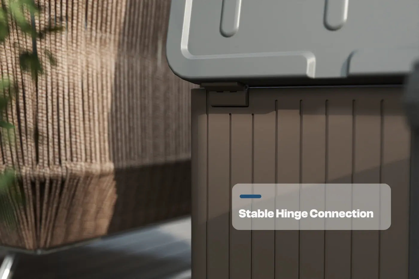 Brown storage bin with a stable hinge connection label, outdoor setting