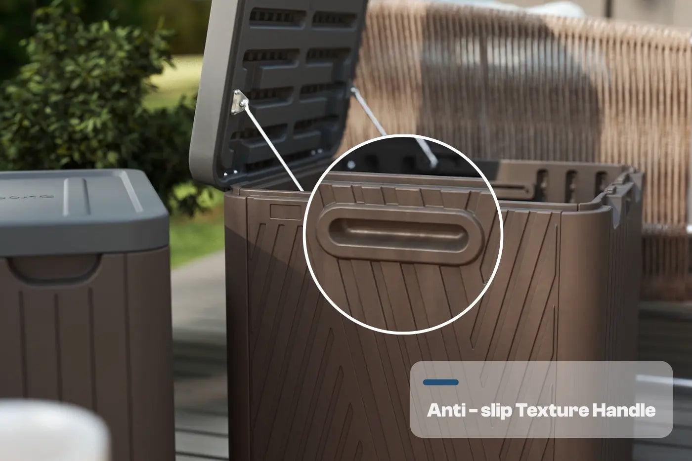 Brown outdoor trash bin with open lid and anti-slip texture handle highlighted, set against a blurred garden background.