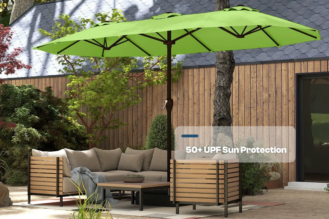 Green patio umbrella with 50+ UPF sun protection over outdoor furniture set.