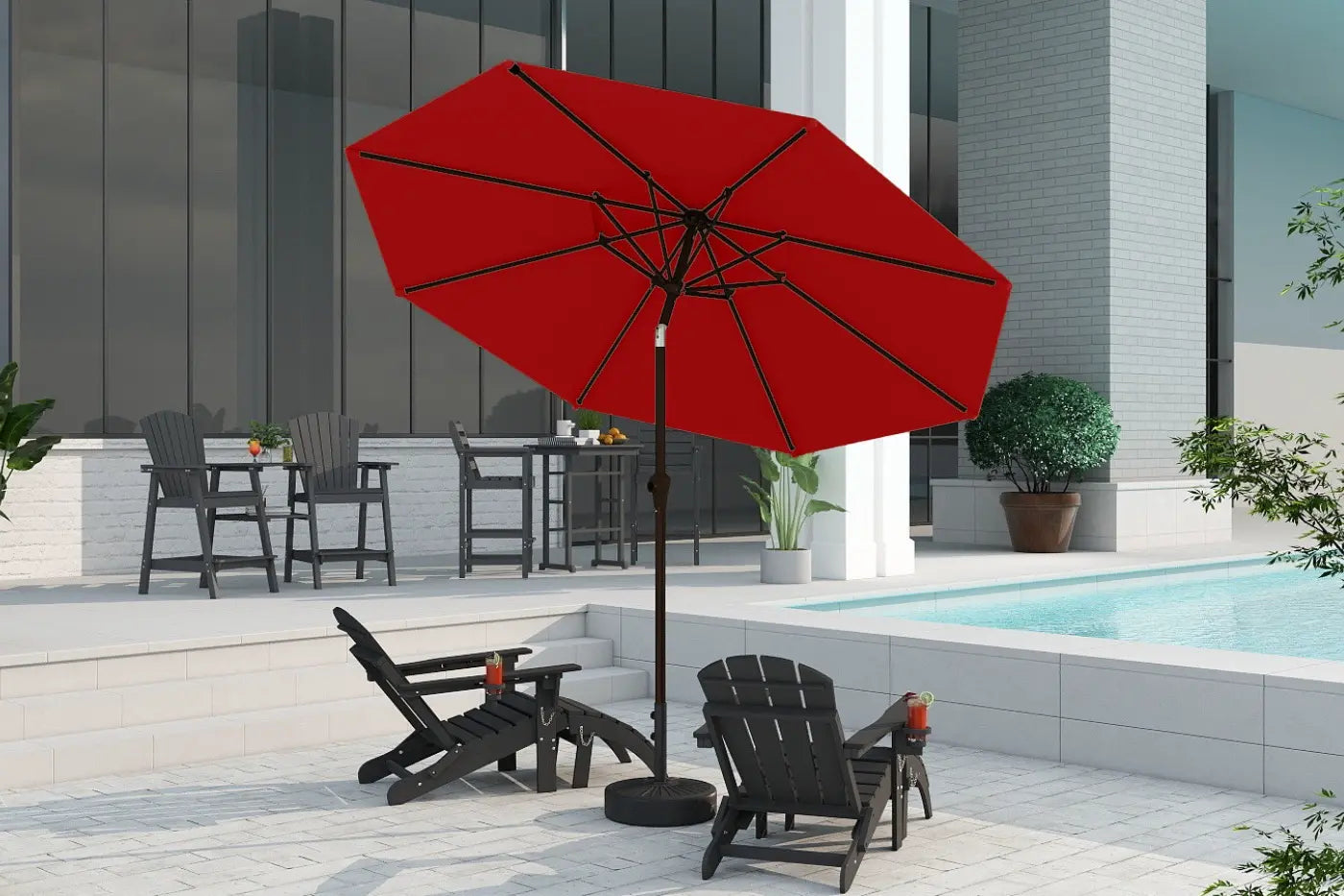 Red patio umbrella on a stand in an outdoor setting with chairs and a pool.