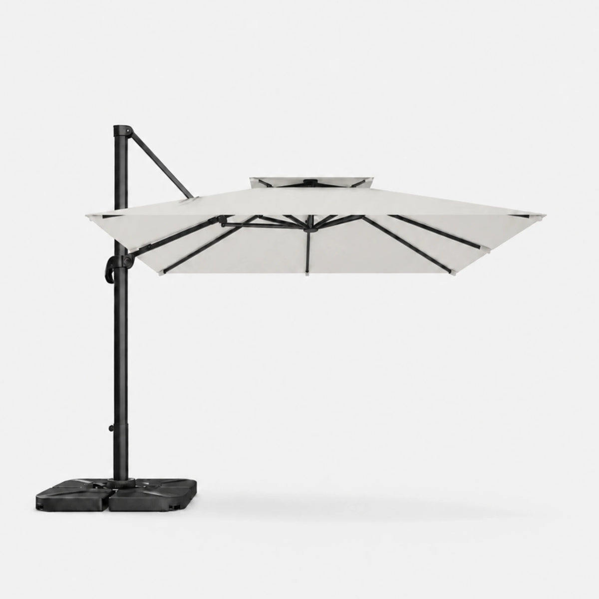 A modern cantilever patio umbrella with a black metal pole and weighted base, featuring a light beige canopy, shown against a plain light gray background.