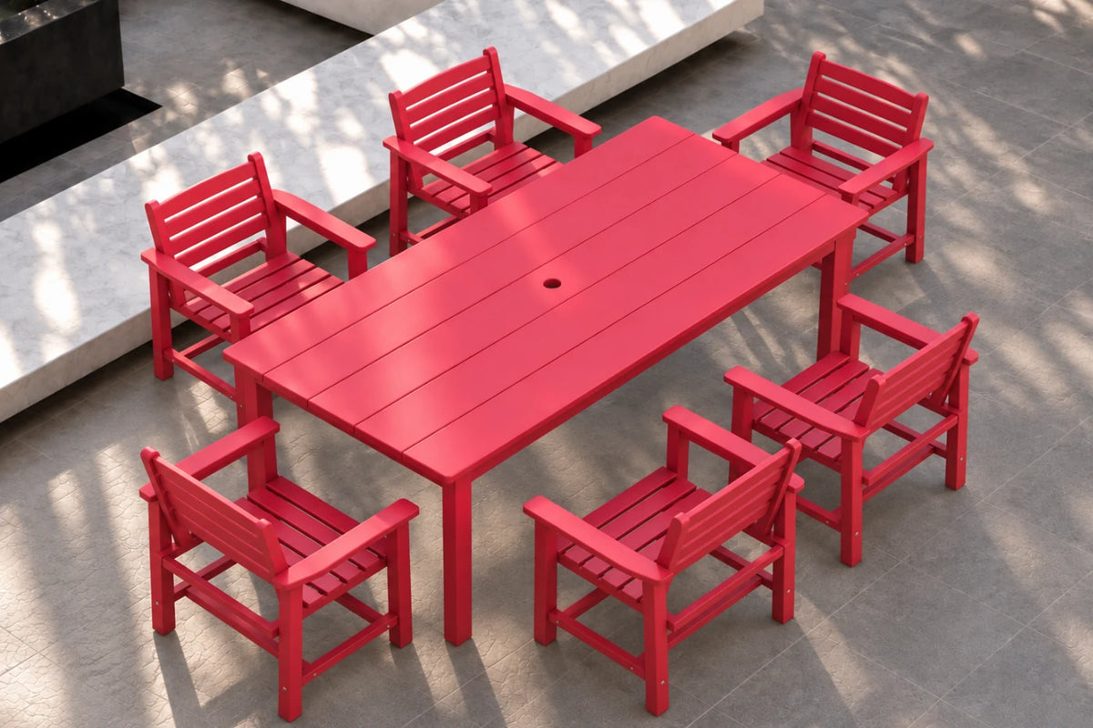 A red outdoor dining set consisting of a rectangular slatted table and six matching armchairs, photographed from an elevated angle on a gray paved patio with dappled sunlight.