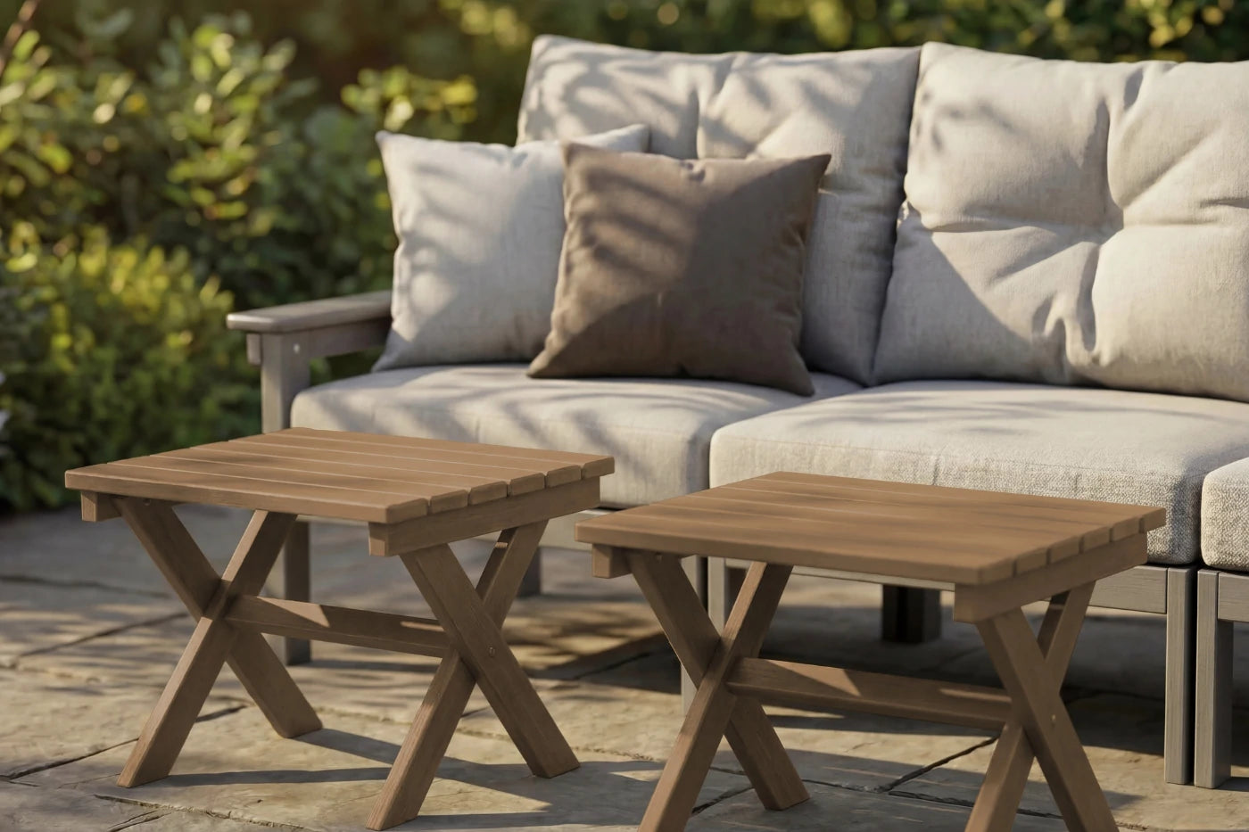 Outdoor furniture set with HDPE tables and a beige sofa with cushions.