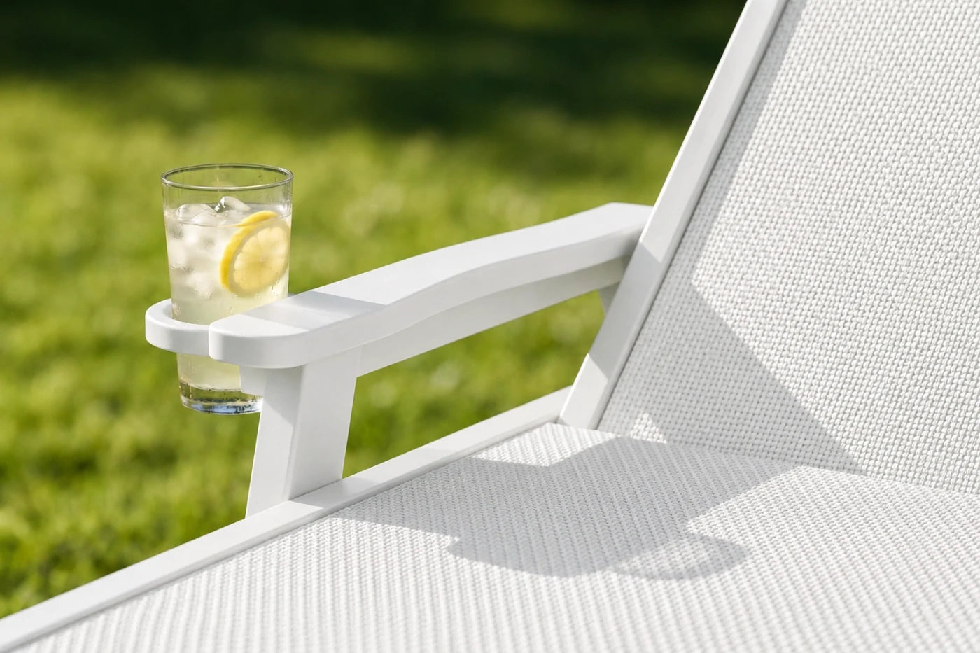 White HDPE Outdoor Chaise Lounge with Textilene Fabric keeps drinks close