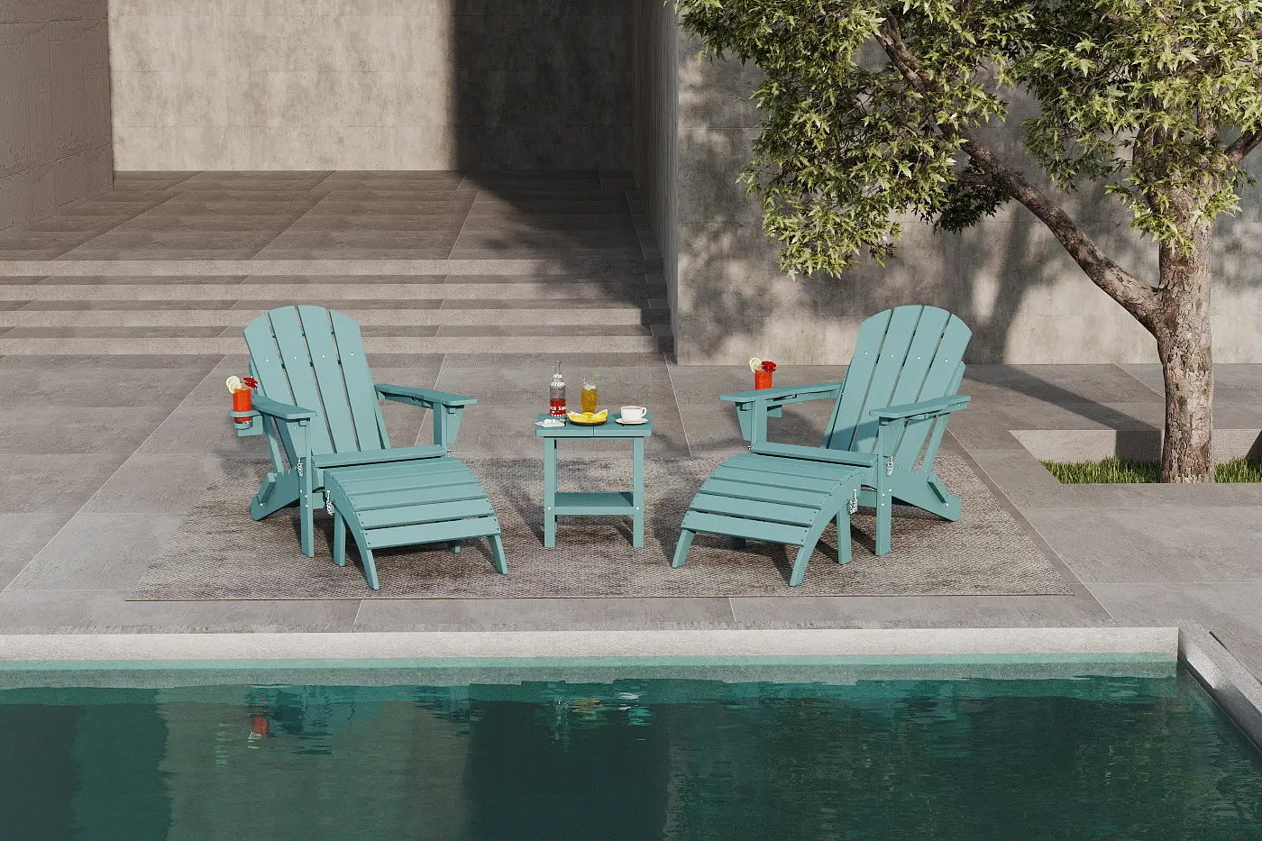 Two teal Adirondack chairs with a small table by a poolside.