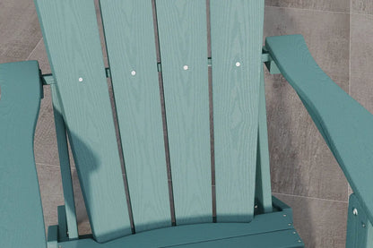Teal Adirondack chair on a tiled floor