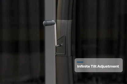 Close-up of a door handle with 'Infinite Tilt Adjustment' text on a blurred background