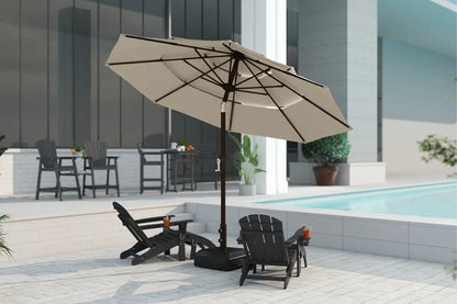 Beige patio umbrella with black stand on a patio area near a pool.