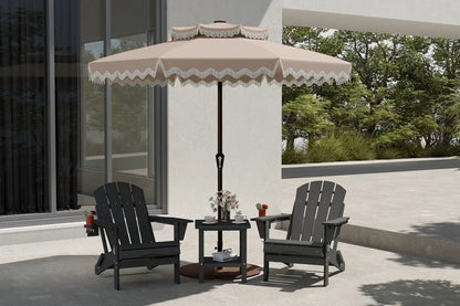 Outdoor patio set with two chairs and a table under a large umbrella on a patio.