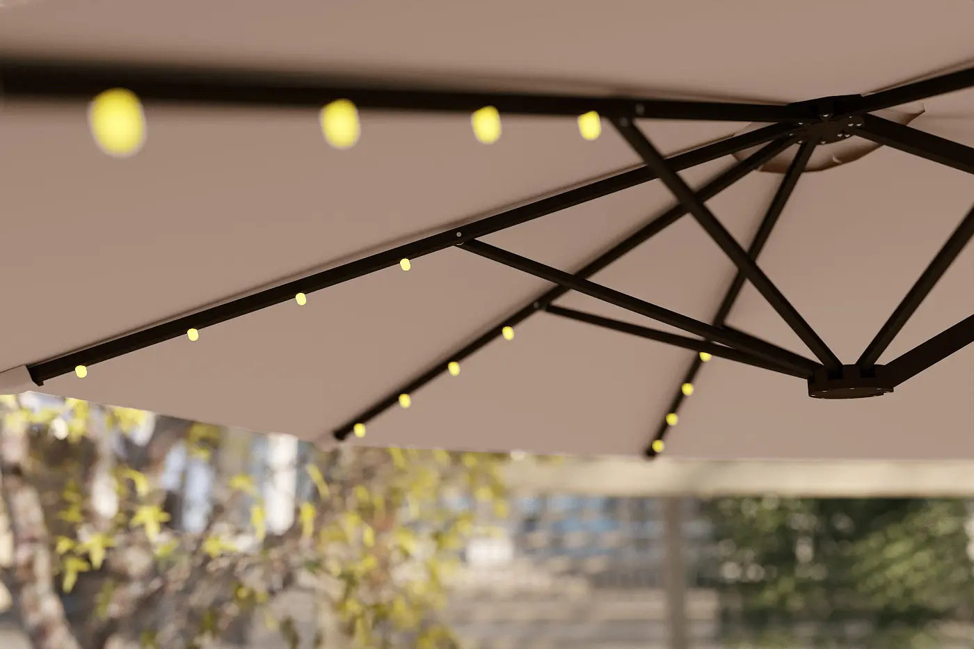 Close-up of a patio umbrella with string lights against a blurred outdoor background