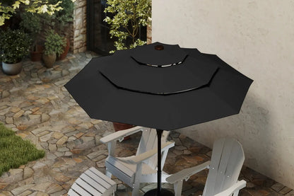 Black patio umbrella on a stand with white chairs in an outdoor setting.