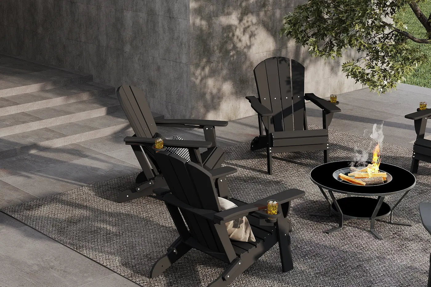 Outdoor patio setting with black Adirondack chairs and a fire pit.