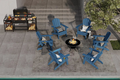 Outdoor patio setup with blue Adirondack chairs, grill, and fire pit.