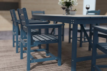 Blue outdoor dining set with chairs and table on a wooden deck.