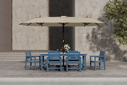 Outdoor dining set with blue chairs and a large beige umbrella on a wooden deck.
