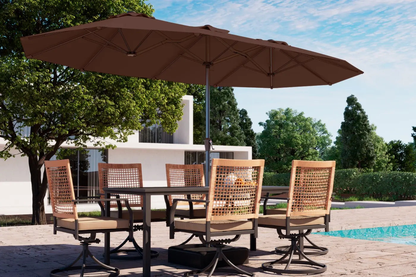 Outdoor dining set with a large umbrella by a poolside