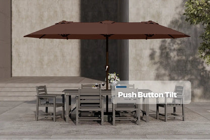 Outdoor dining set with a large brown umbrella on a stone patio.