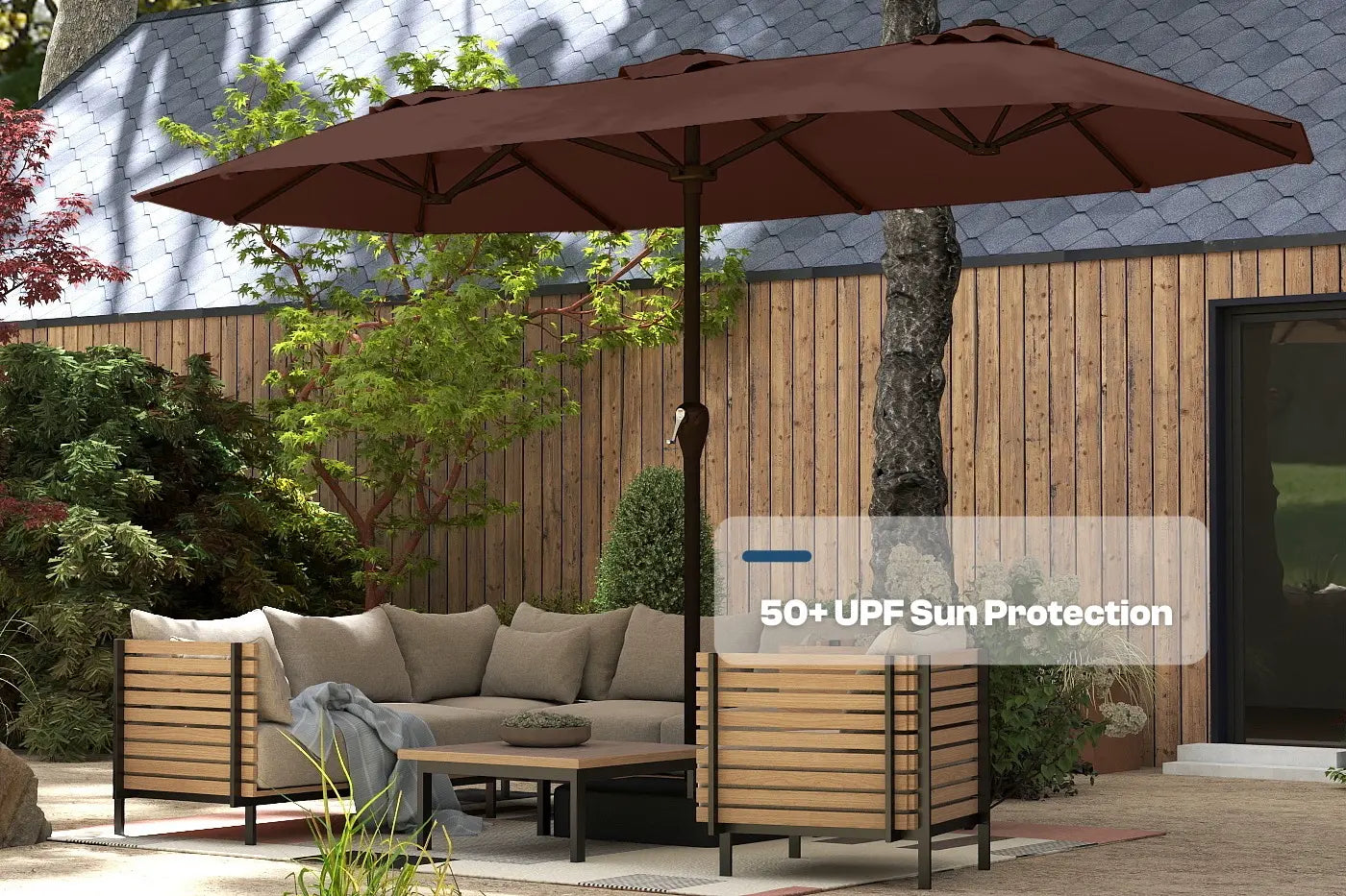 Outdoor patio set with a large umbrella providing shade in a garden setting.
