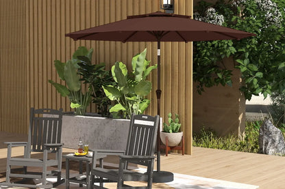 Patio set with chairs, table, and umbrella on a wooden deck