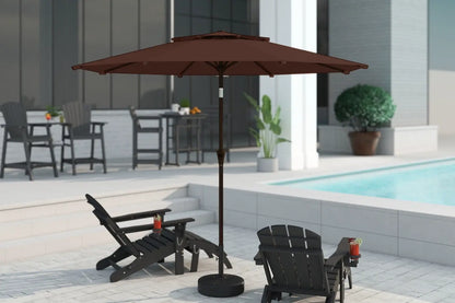 Brown patio umbrella on a stand with lounge chairs and a pool in the background