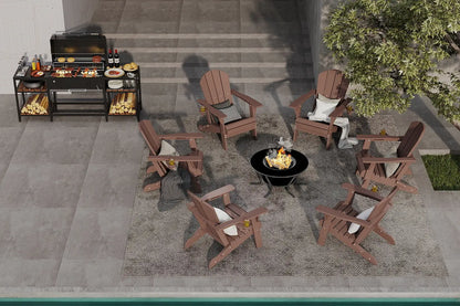 Outdoor patio setup with wooden chairs, grill, and fire pit on a stone patio.