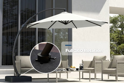 Outdoor patio umbrella with 360-degree rotation feature in a garden setting.