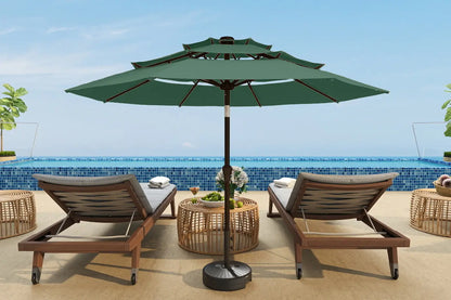 Outdoor patio set with two lounge chairs and a large green umbrella on a sunny day.