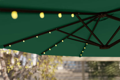 Green patio umbrella with string lights against a blurred outdoor background