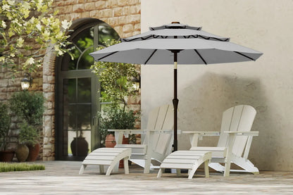 Outdoor patio set with two chairs and a large umbrella on a wooden deck.