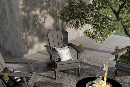 Outdoor patio scene with Adirondack chairs and a fire pit.