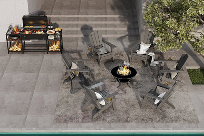 Outdoor patio setup with chairs, grill, and fire pit on a concrete patio.