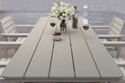 Outdoor table with flowers and glasses, featuring text on fade resistance, odor-free, all weather, and low maintenance.