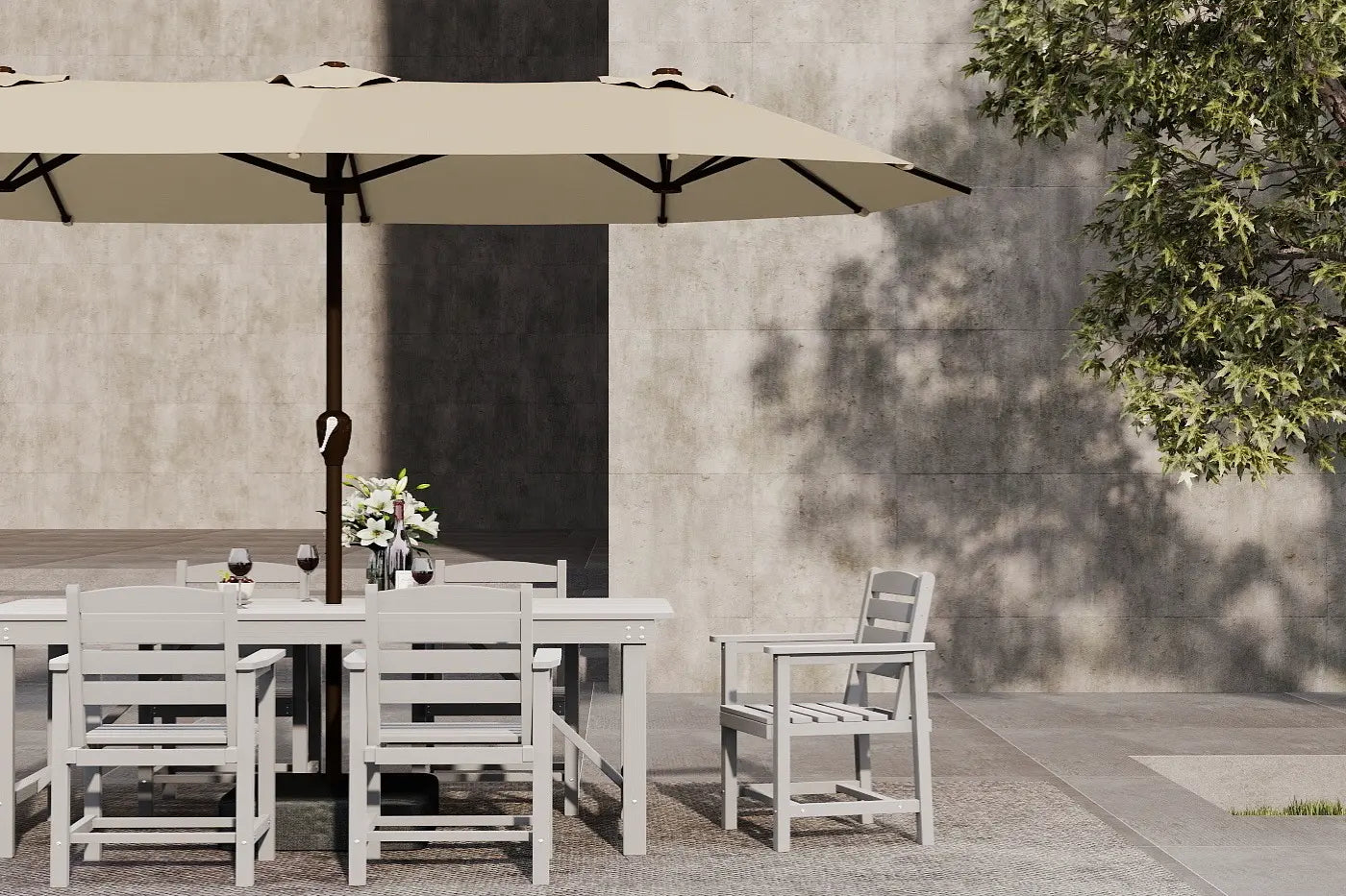 Outdoor dining set with table, chairs, and umbrella against a concrete wall.