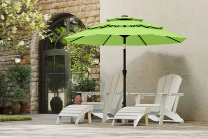 Green patio umbrella with white chairs in an outdoor setting.