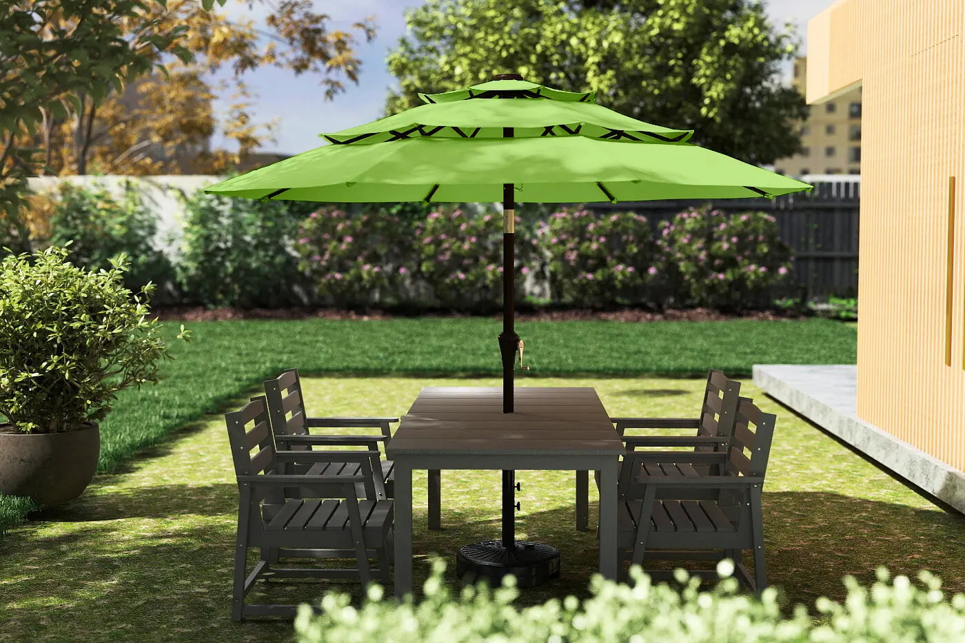 Outdoor patio set with a green umbrella on a grassy area