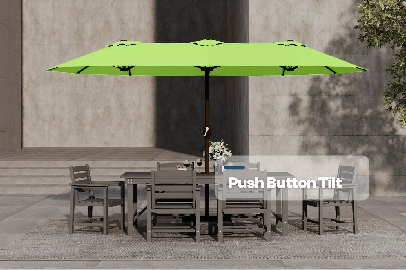 Green patio umbrella with push button tilt feature over a dining set on a patio.