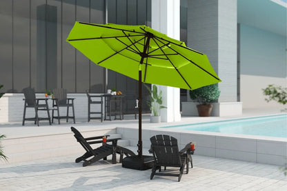Green patio umbrella on a stand in an outdoor setting with chairs and a pool.