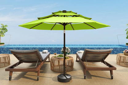 Outdoor patio setup with two lounge chairs and a green umbrella by a pool.