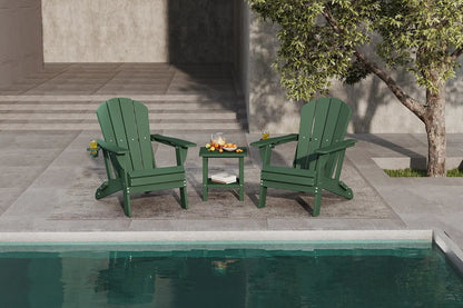 Two green Adirondack chairs with a small table by a poolside.