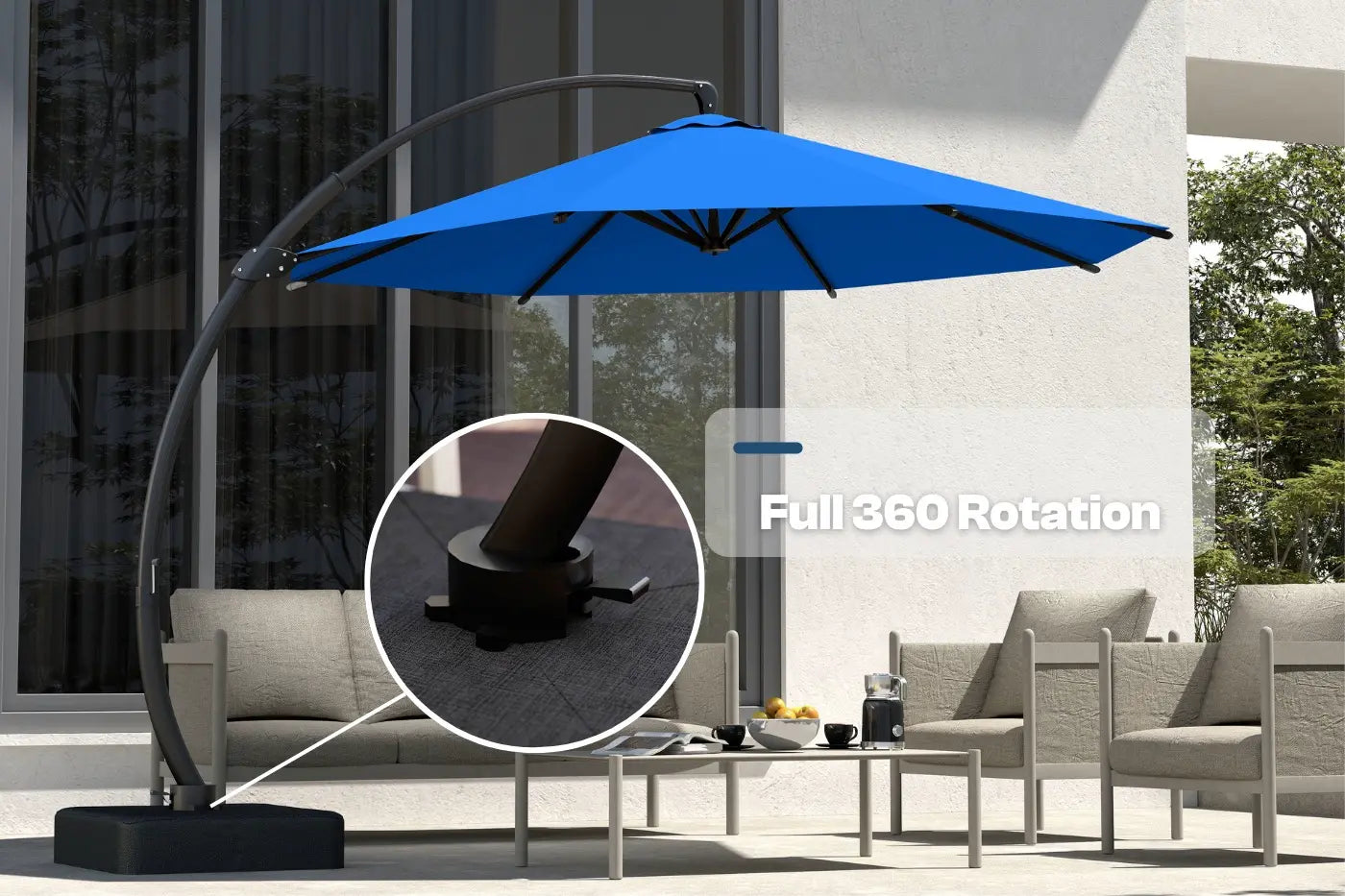 Blue patio umbrella with 360-degree rotation feature in an outdoor setting.