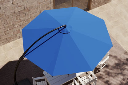 Blue patio umbrella on a table with a brick wall background