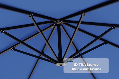 Close-up of an umbrella's black aluminum frame against a blue background with text 'EXTRA Sturdy Aluminum Frame'.