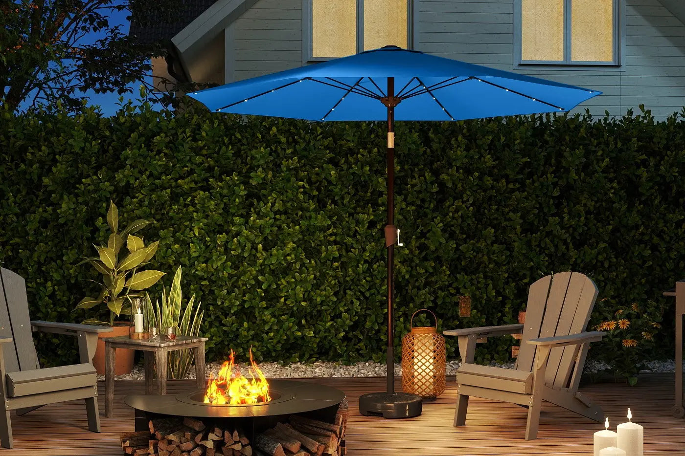 Outdoor patio scene with a blue umbrella, chairs, fire pit, and candles.