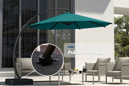 Turquoise patio umbrella with 360-degree rotation feature in an outdoor setting.