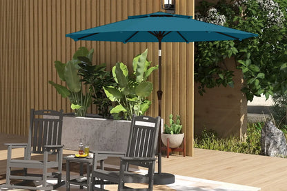 Patio set with a blue umbrella, chairs, and a table on a wooden deck.
