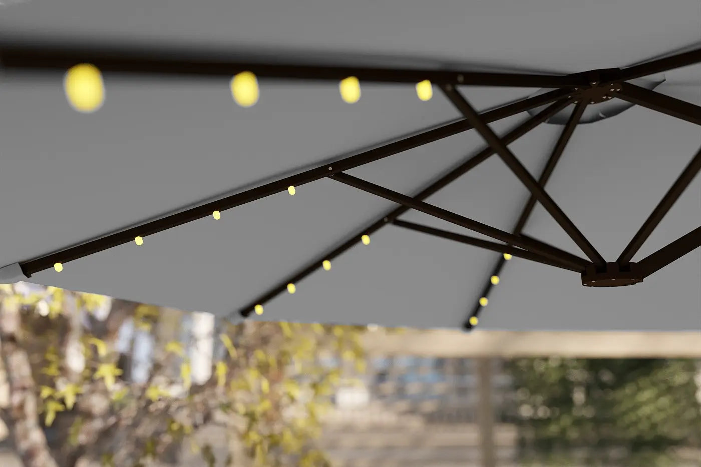 Outdoor umbrella with string lights against a blurred background