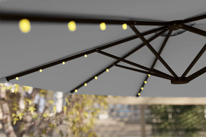 Outdoor umbrella with string lights against a blurred background