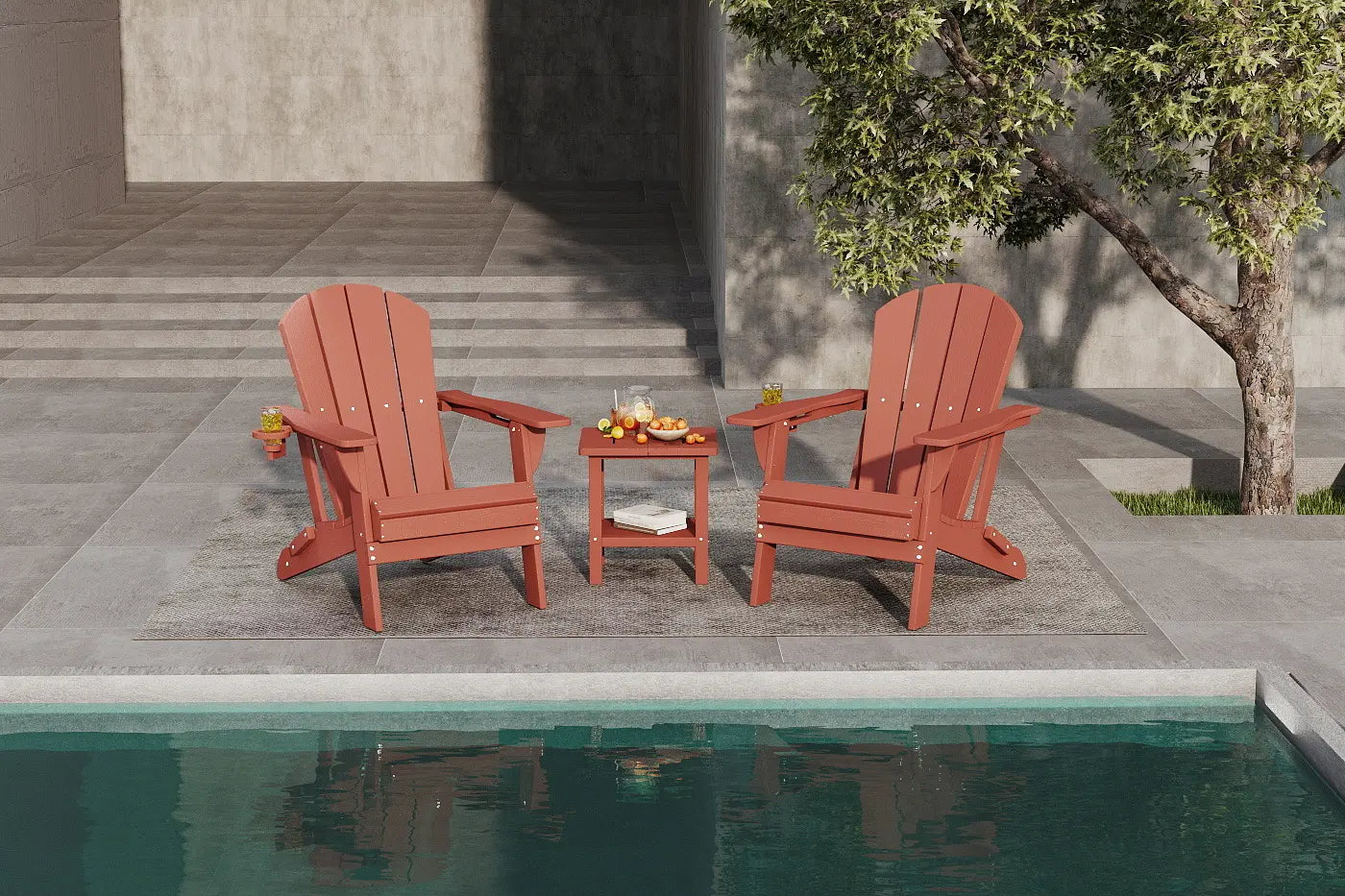 Two red Adirondack chairs with a small table by a poolside.